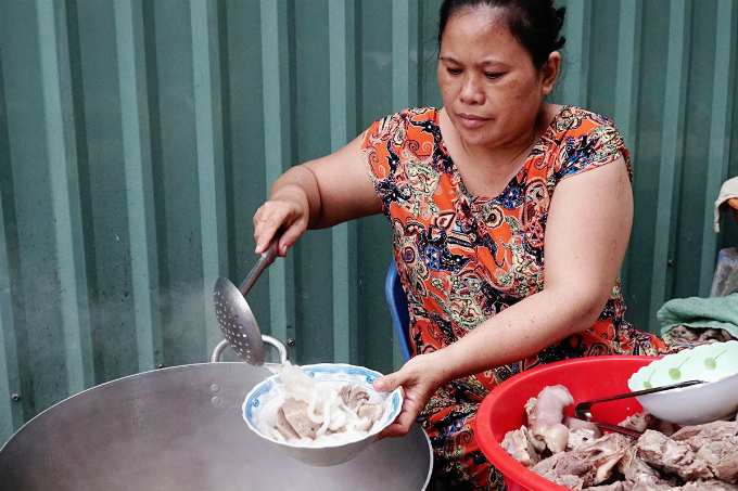 Hanh is in charge of cooking and seasoning the broth. She said family members help her preparing the dish from washing, cutting, and putting ingredients into baskets ready to be served. 