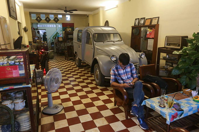 A Weapons Vault Vaults Into A Café in Saigon